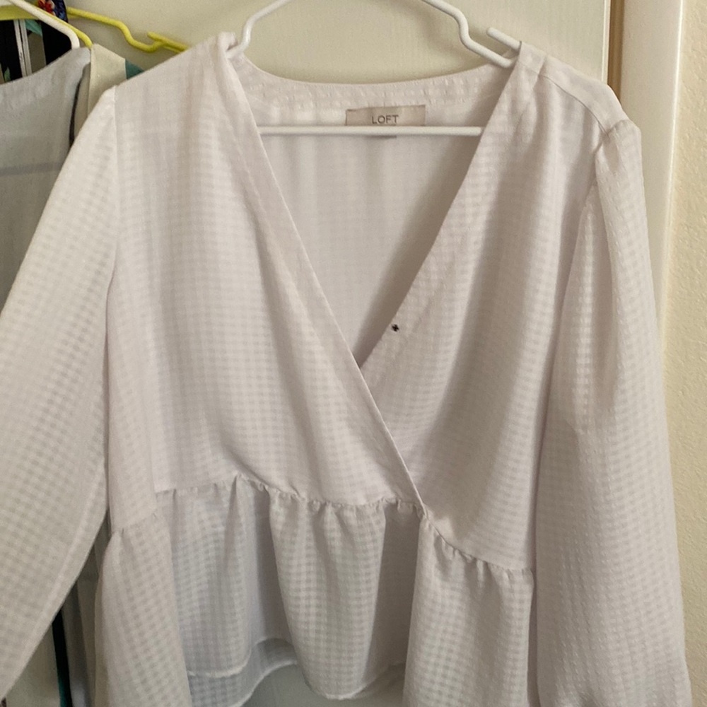 White peplum top from Loft